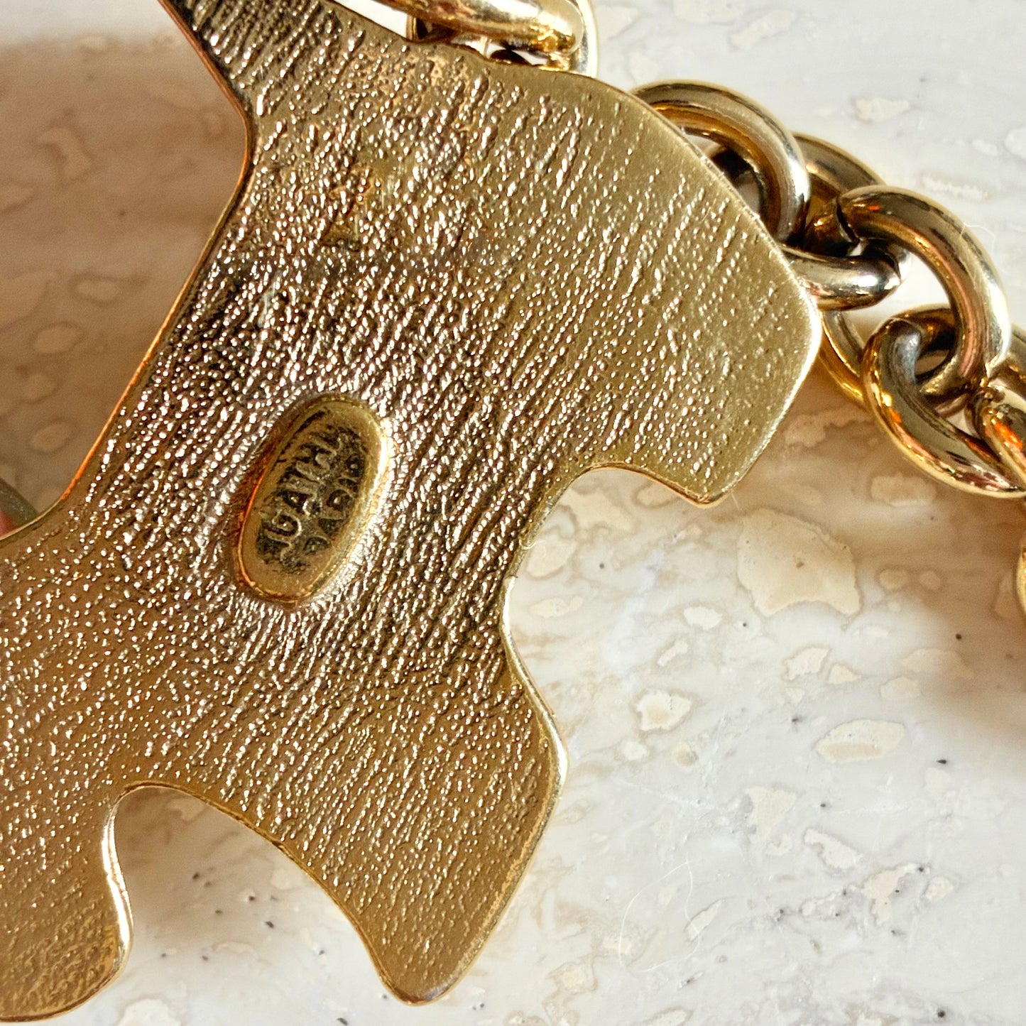 Agatha 90's chain belt with iconic Scottie dog