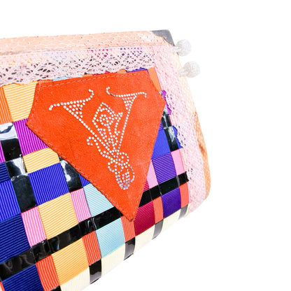 Invest in the Original Voyage 90's Python Clutch